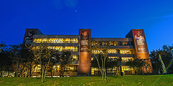 NIU Founders Memorial Library at night
